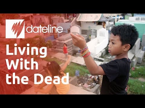 Why are Filipino communities living in cemeteries and caring for its dead?