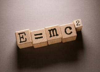 E = mc 2 Word Written on Wooden Cubes