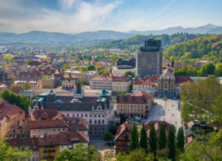 Eko mesec Univerze v Ljubljani Panoramic view of Ljubljana city center from castle hill, Ljubljana, Slovenia. The main building of the University of Ljubljana and Congress square