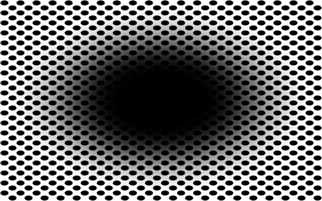 Optična iluzija belega ozadja z manjšimi črnimi elipsami in velika črna elipsa na sredini, ki jo obdaja temen sij