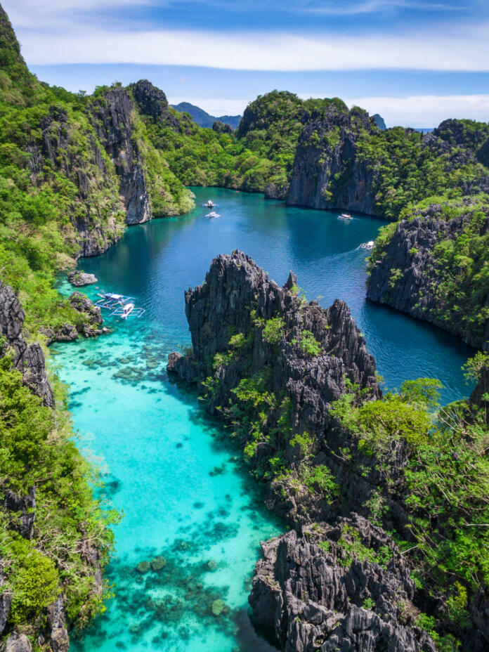 Aerial view of beautiful lagoon and limestone cliffs in El Nido, Palawan, Philippines.