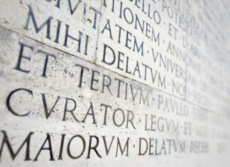 PER ASPERA AD ASTRA! ancient roman epigraph on a marble wall