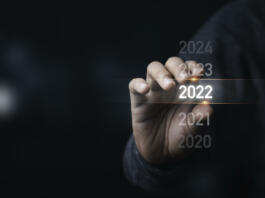 Businessman holding infographic  2022 year,Preparation Merry Christmas and happy new year concept.