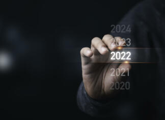 Silvestrovanja po Sloveniji Businessman holding infographic 2022 year,Preparation Merry Christmas and happy new year concept.