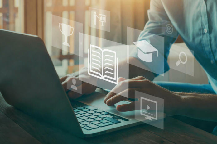 e-learning-education-concept-learning-online-with-webinar-video-tutorial-internet-lessons-stockpack-istock e-learning education concept, learning online with webinar, video tutorial, internet lessons