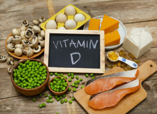 Vitamini za zdravje Foods rich in vitamin D on a wooden table