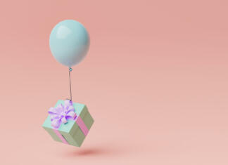 Znani so nagrajenci! gift box with a balloon floating in the air and space for text. concept for celebrations, birthdays and holidays. 3d render