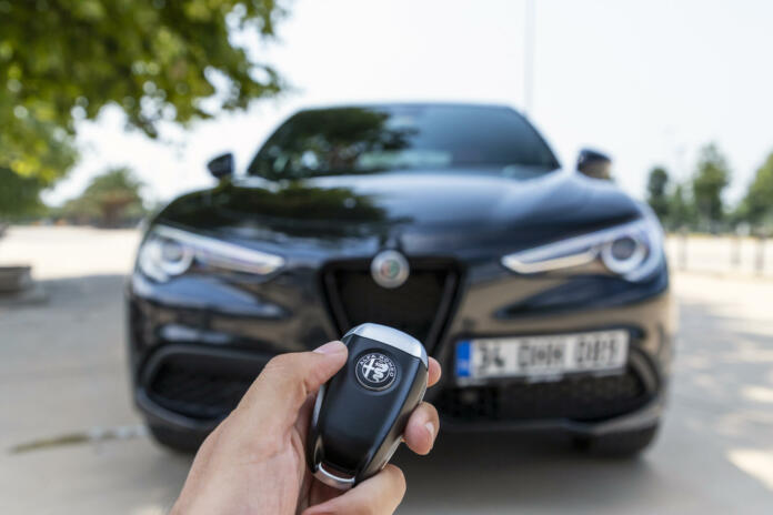 Istanbul, Turkey - July 13 2021 : The New Alfa Romeo Stelvio is the new optimal performance and utility SUV. It has wireless car key.