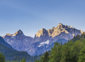 Potepi po Sloveniji Lake and mountains near the village Kranjska Gora in Triglav national park, Slovenia