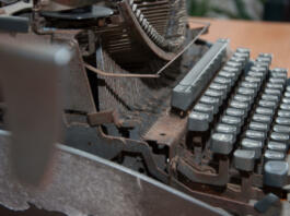 old rusty abandoned typewritter in office