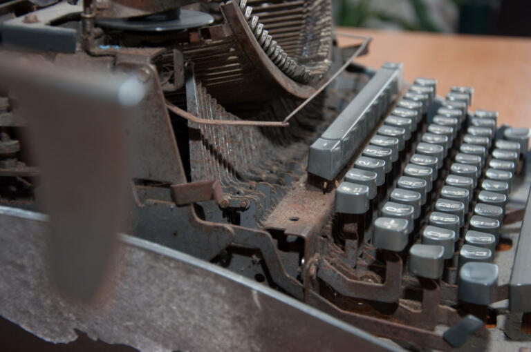 old rusty abandoned typewritter in office