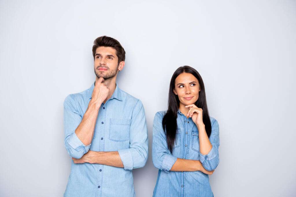 Portrait of his he her she nice-looking attractive lovely charming cheerful bewildered suspicious, couple partners wearing casual creating idea isolated over light white pastel color background