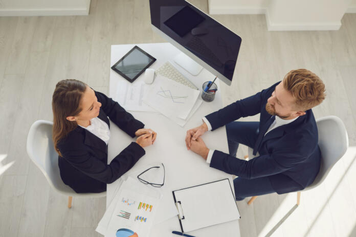 Recruitment of people. Applicant man at the interview in the office.