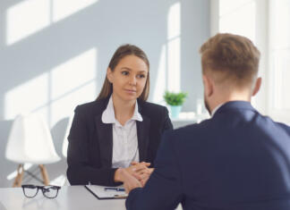 Oblike dela za podjetne študente Recruitment of people. Applicant man at the interview in the office.