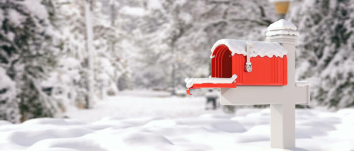 Snow covered mailbox, blur snowed country nature background. Empty retro postbox red color open with raised flag. Correspondence in winter. 3d illustration