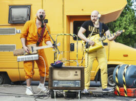 Vilnius, Lithuania - May 18, 2019: Eccentric two man rock band with handmade musical instruments performing on the street at traditional street music day in Vilnius, Lithuania