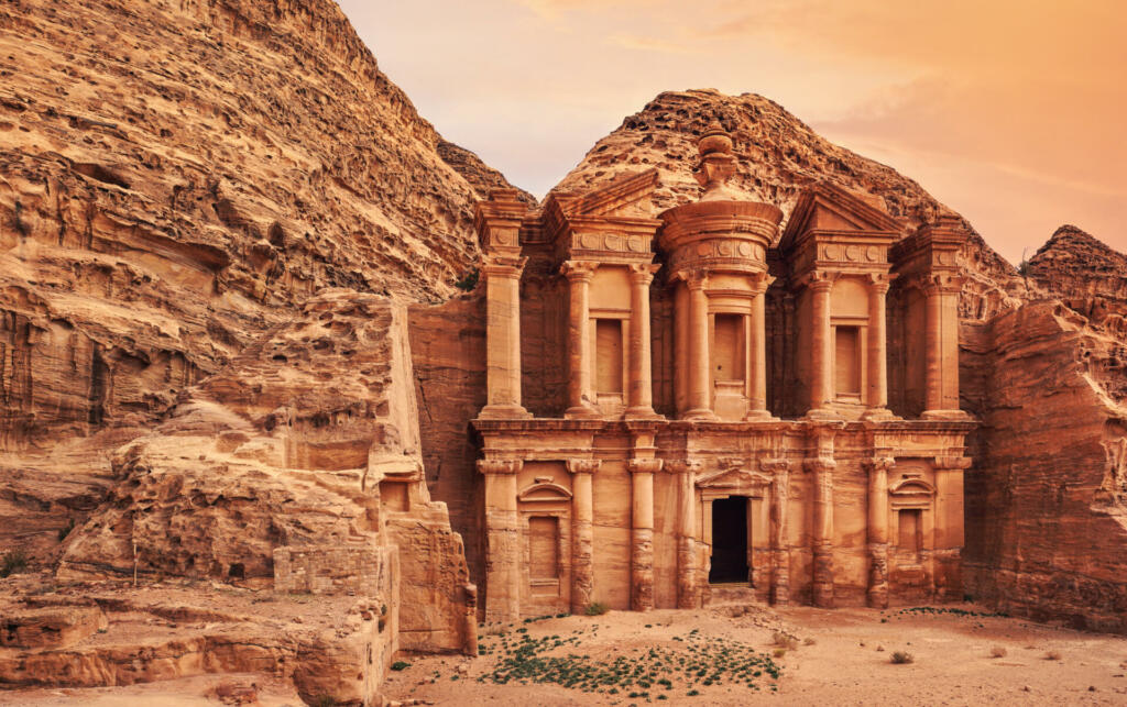 Ad Deir - Monastery - ruins carved in rocky wall at Petra Jordan.