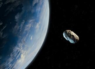 Ogromen asteroid je 29. aprila letel mimo Zemlje Asteroid is approaching a blue planet. Space stone is moving towards the Earth. View from space. Great extinction.