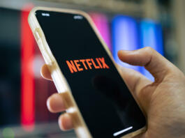 Bangkok, Thailand - April 25, 2022 : iPhone 13 showing its screen with Netflix application.