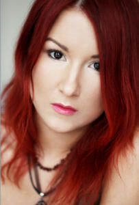 Beautiful redhead young woman with bright make up portrait