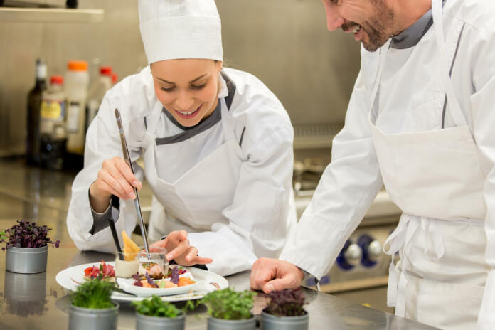 Chef teaching to cook