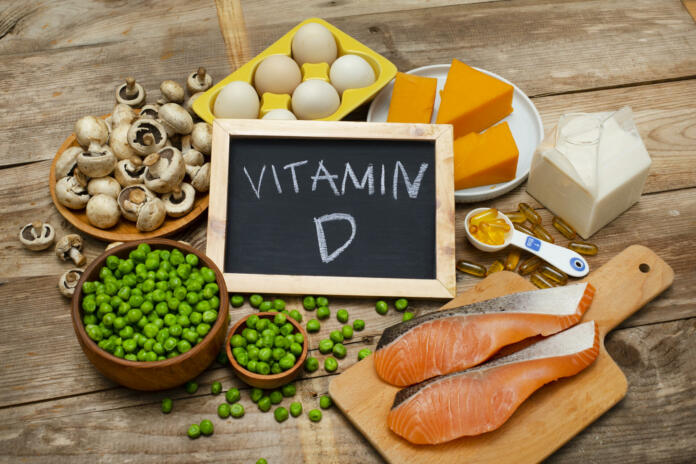 Foods rich in vitamin D on a wooden table