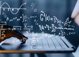 Top 10 dogodkov v znanosti 2019 Hands using laptop with mathematical formulas. Online education concept