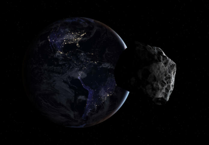 Hazardous asteroid approaching to planet Earth from night side. Concept a potentially hazardous object (PHO). Planet Earth from the space at night and asteroid. North America, Central America, and South America at night viewed from space with city lights. Elements of this image furnished by NASA. ______ Url(s): https://earthobservatory.nasa.gov/features/NightLightsSoftware: Adobe Photoshop CC 2015. 3ds Max 2016