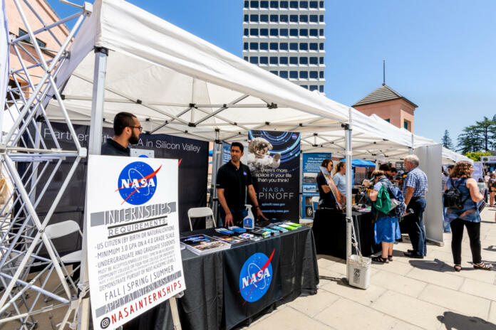 July 16, 2019 Mountain View / CA / USA - Representatives from NASA talk to visitors at Technology Showcase event in Silicon Valley