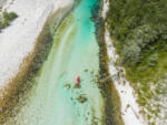 Kayaking and Rafting Adventure on River Soca in Slovenia near Bovec in Summer.