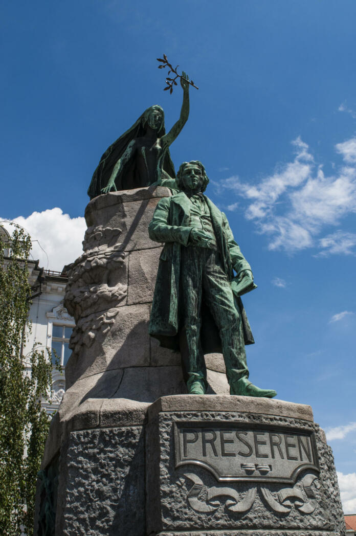 Ljubljana, Slovenia, Europe - June 24, 2018: view of the Prešeren Monument in Ljubljana, a late Historicist bronze statue of the Slovene national poet France Prešeren (1800-1849) by Ivan Zajec in Prešeren Square