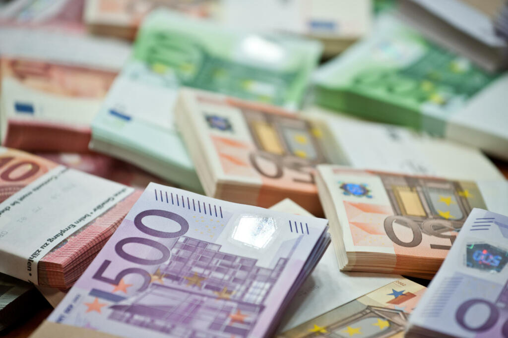 lots of euro bills on the table