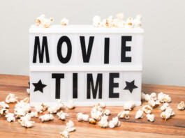 Movie time text in lightbox with popcorns