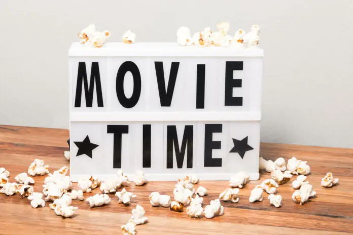 Movie time text in lightbox with popcorns