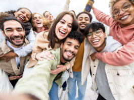 Multiracial friends group taking selfie portrait outside - Happy multi cultural people smiling at camera - Human resources, college students, friendship and community concept