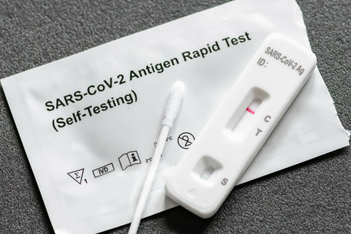 Negative Covid-19 antigen test kit, one step coronavirus antigen rapid test, saliva swab, 1 test box with imagine of lungs, close up