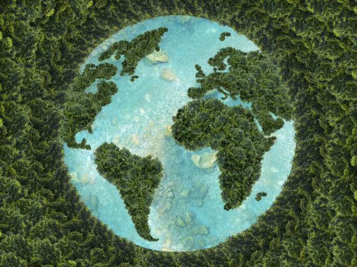 Planet earth on a green background. Green continents made from the crown of a tree. Clear azure water. The ecological concept of the survival of the planet.