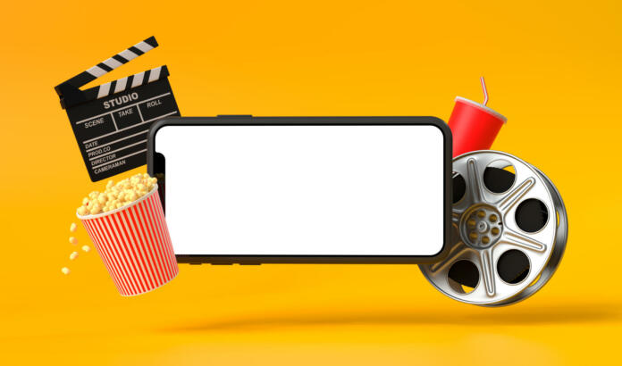 Smartphone blank screen with popcorn, film strip, clapperboard and drink on yellow background. oncept of online movie viewing. 3D rendering, 3D illustration