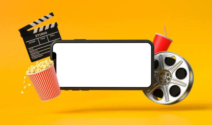 smartphone-blank-screen-with-popcorn-film-strip-clapperboard-and-drink-on-yellow-background-oncept-of-online-movie-viewing-3d-rendering-3d-illustration-stockpack-istock Smartphone blank screen with popcorn, film strip, clapperboard and drink on yellow background. oncept of online movie viewing. 3D rendering, 3D illustration