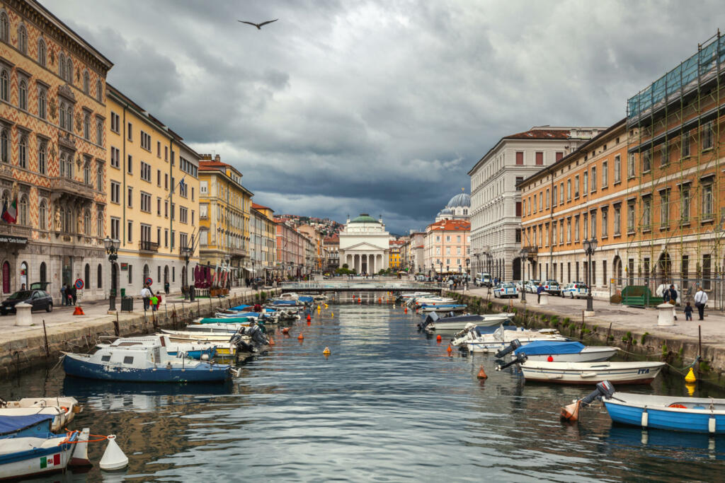 Trieste, Friuli Venezia Gulia, Italy - May 25, 2013: Life on Canal Grande in center of the old city in a bad weather day.