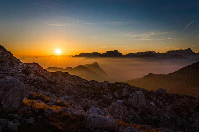 Triglav national park sunlit mountains peaks, Soca Trenta valley forest view,  backpacking, hiking Slovenia nature, travel Europe.