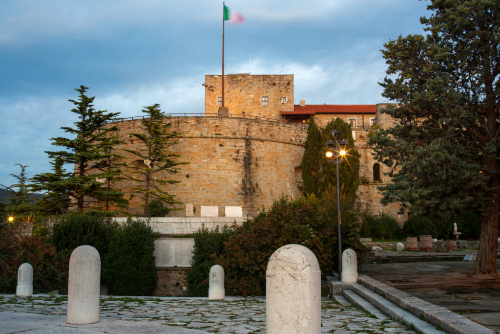 View of St. Giusto Castle at sunset in Trieste