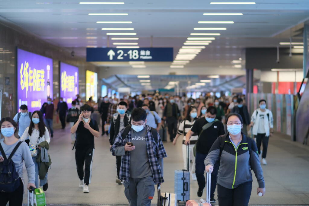 Wuhan/China-Oct.2020: passengers wearing face mask to prevent coronavirus, walking in Hankou Railway Station