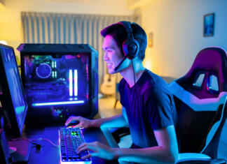 Strateške igre za PC, ki jih ne bomo nikoli pozabili Young Asian Handsome Pro Gamer Playing in Online Cyber Sport Game at home
