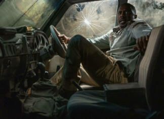 Ocena filma: Zver Zver je akcijski film, kjer mora Idris Elba družino obraniti pred teritorialnim levom