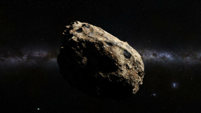 asteroid in deep space lit by the stars