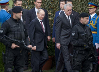 20 zanimivosti o Putinu Belgrade, Serbia - October 16, 2014: Russian President Vladimir Putin and Serbian President Tomislav Nikolić during the military parade "March of the victorious" in Belgrade. President Vladimir Putin of Russia arrived in Belgrade to commemorate the city’s liberation by the Red Army and Yugoslav Partisans in 1944. during World War II.