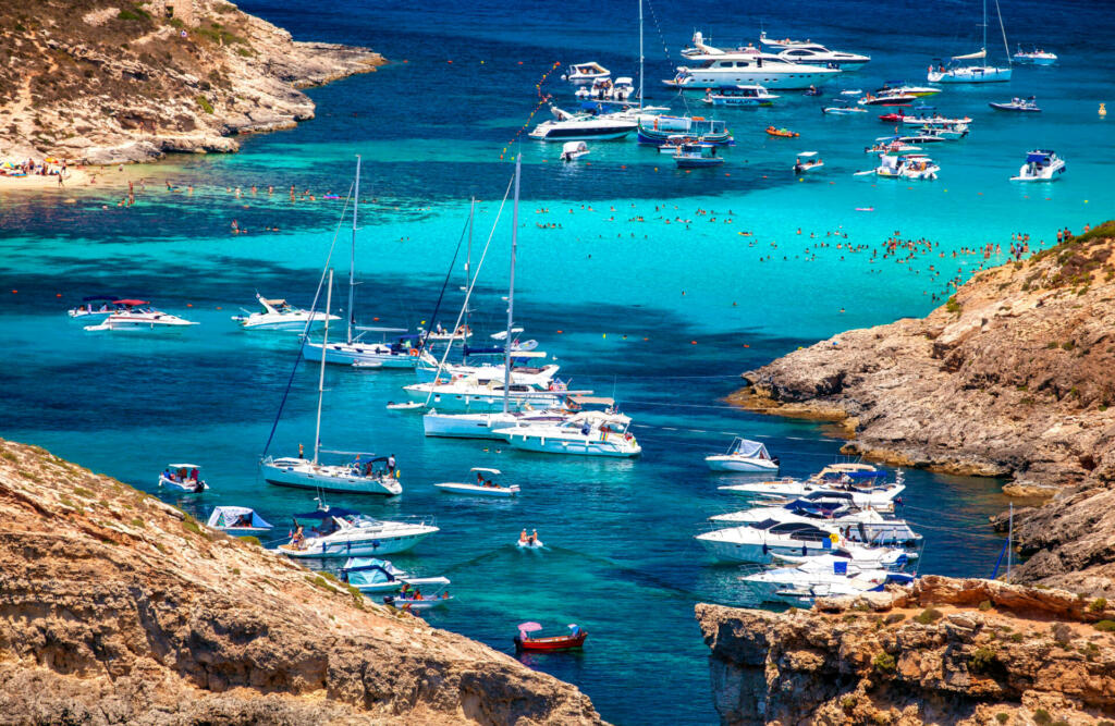 COMINO, MALTA - JULY 16: Ships at  Blue lagoon at island Comino - Malta on July 16, 2015 in Comino
