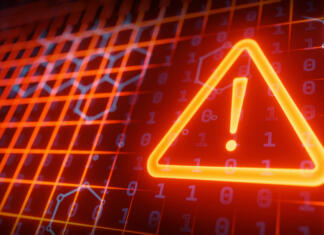 Kako se zavarovati pred spletnimi goljufijami? CPU on board with security alert hologram