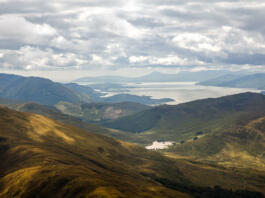 Hilly landscape with view on Loch Linhe from slopes of Ben Nevis, highest UK mountain, during the cloudy afternoon